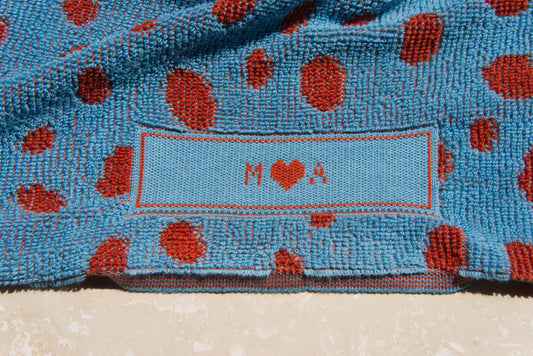 Embroidered versus knitted personalised towels