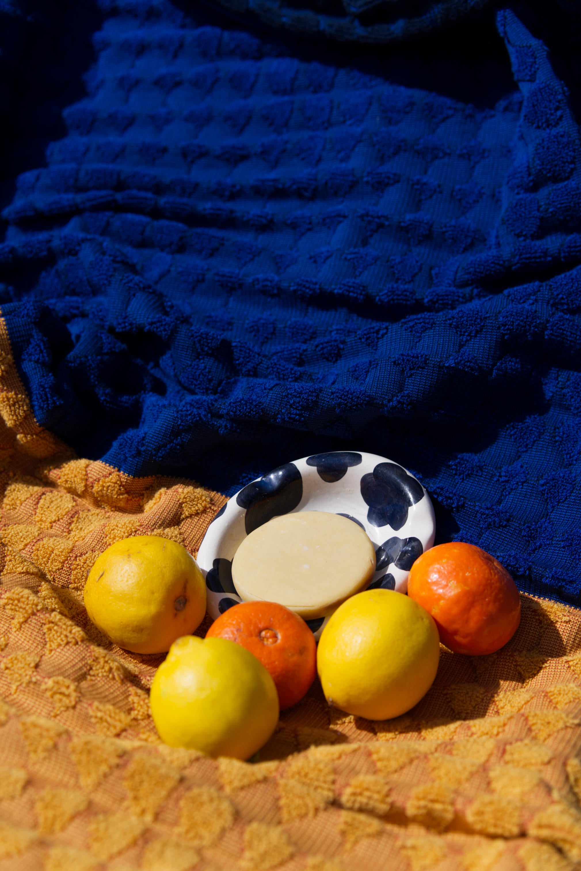 Knitted blue and orange FOLD Pond Bath Towel